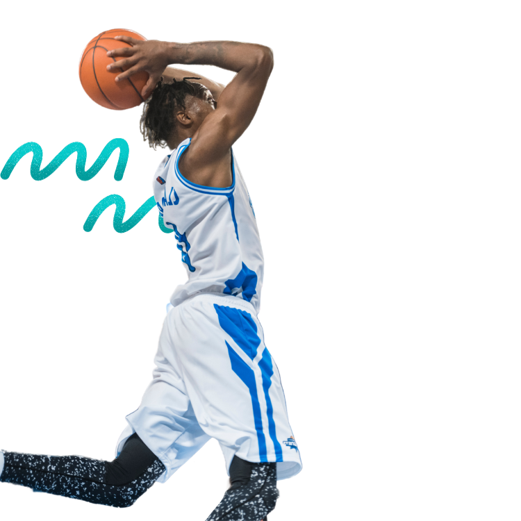 Basketball player wearing a white and blue uniform, jumping with a basketball held above their head, preparing to shoot.