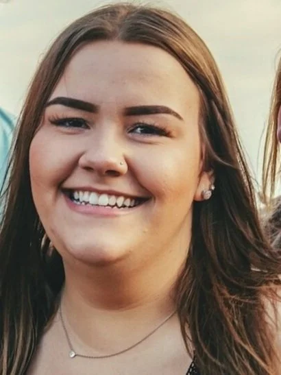 Photo cropped so only one person is visible