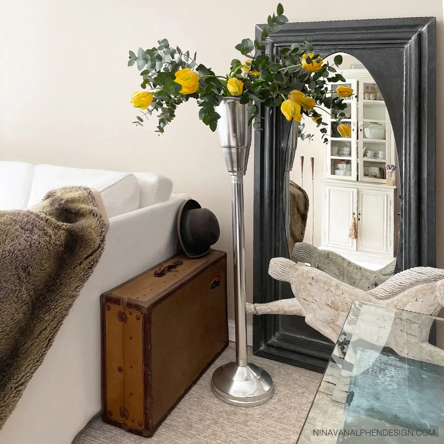 beige-living-room-with-yellow-tullip-vase-design-by-nina-van-alphen-long-island-ny.jpg