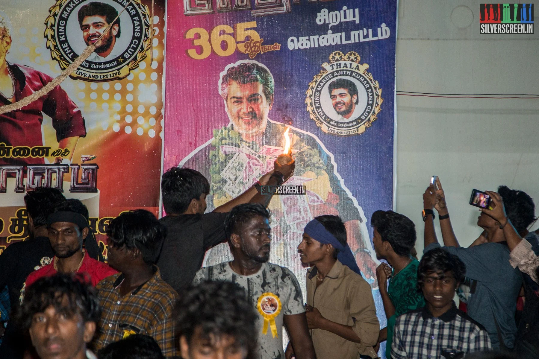 Fans Perform Arati for a Film Hoarding of Film Star, Ajith, southern India, 2016
