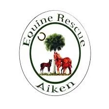 Logo for Equine Rescue Aiken featuring a tree and two horses inside a circular design
