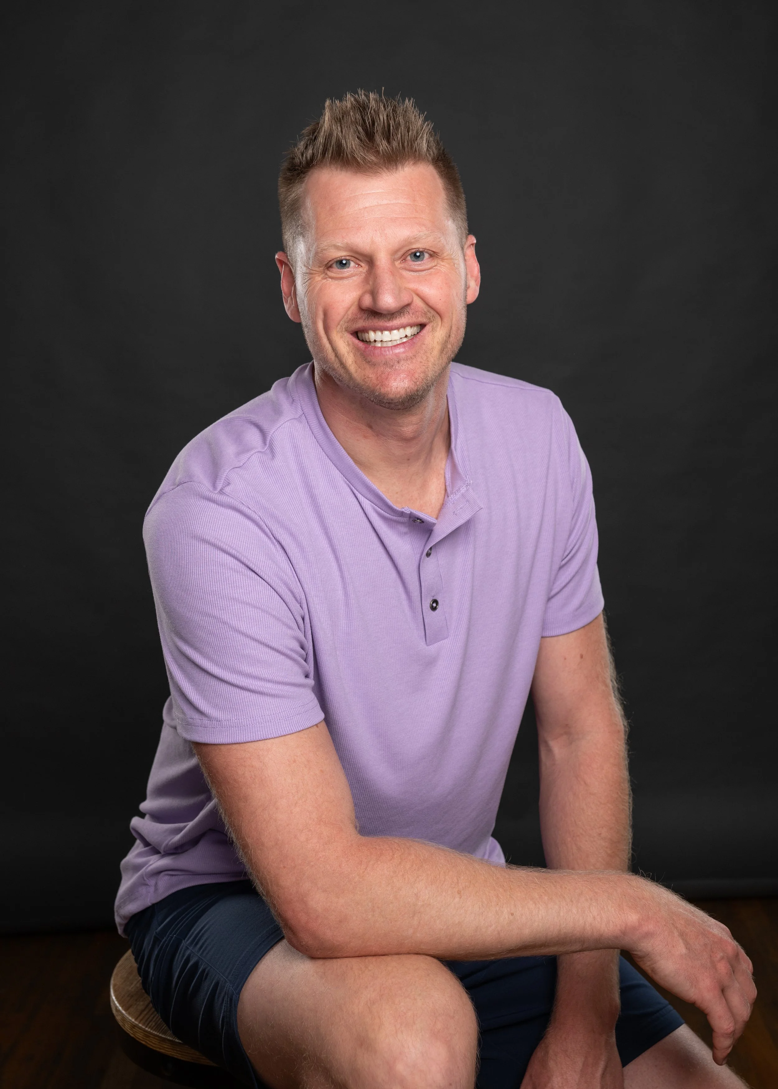personal trainer and motivator headshots in studio