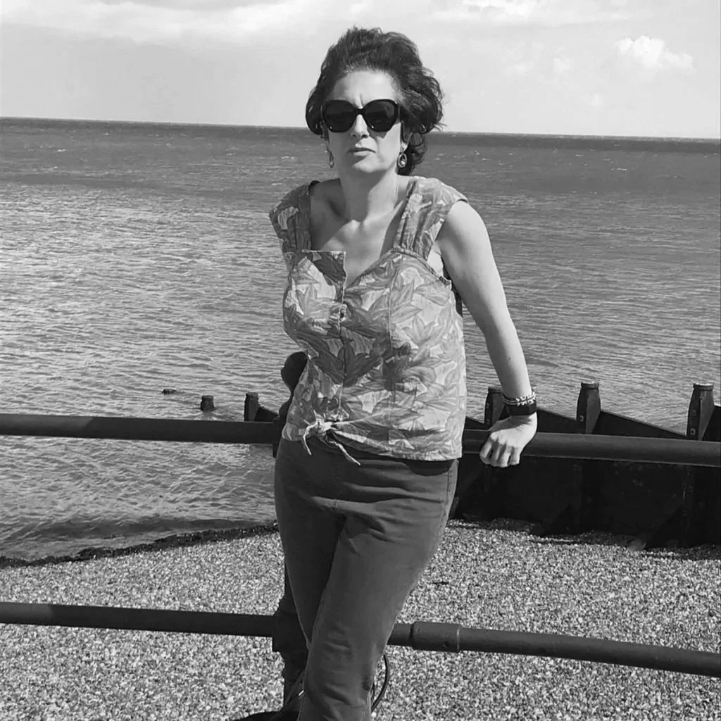 Vicki stood on a beach