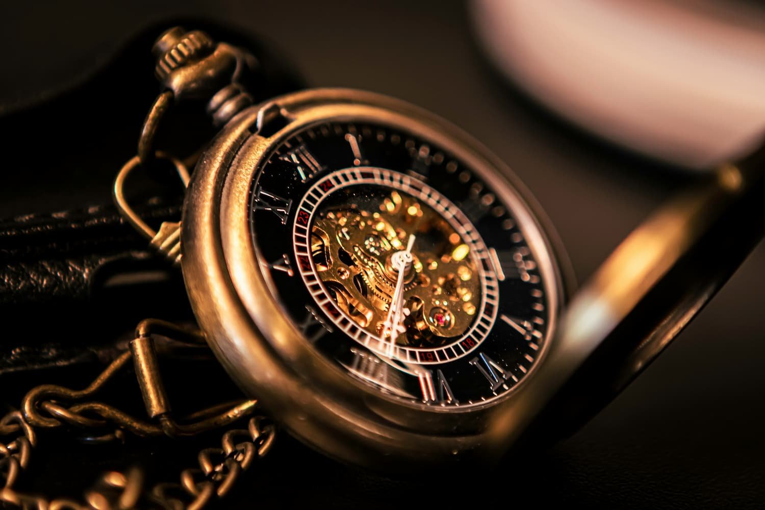A pocket watch with inner workings exposed | Aesthetic vs. world-building