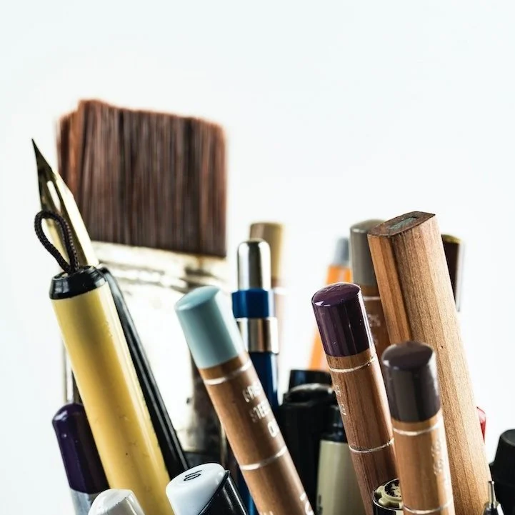 A cup of pens and brushes | Types of editing