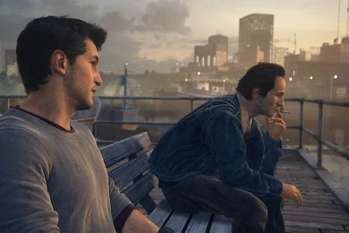Nathan and Sam chatting on a bench