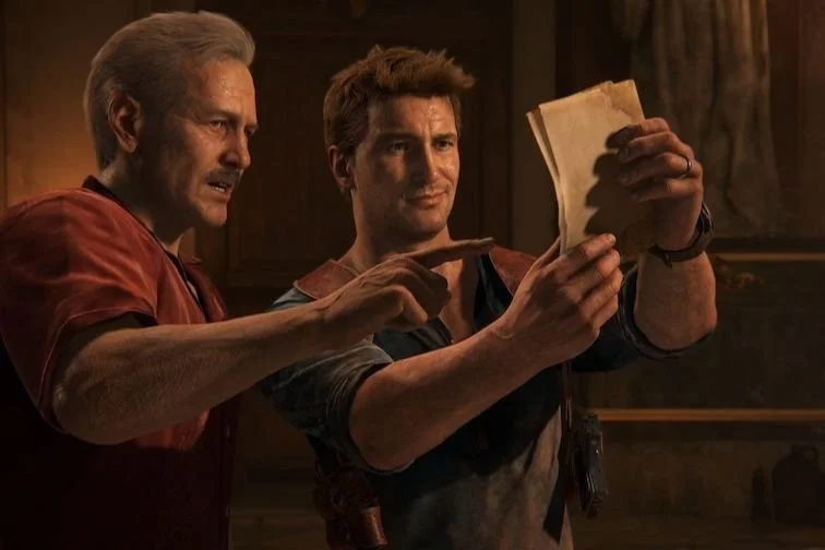 Nathan and Sully looking at a map