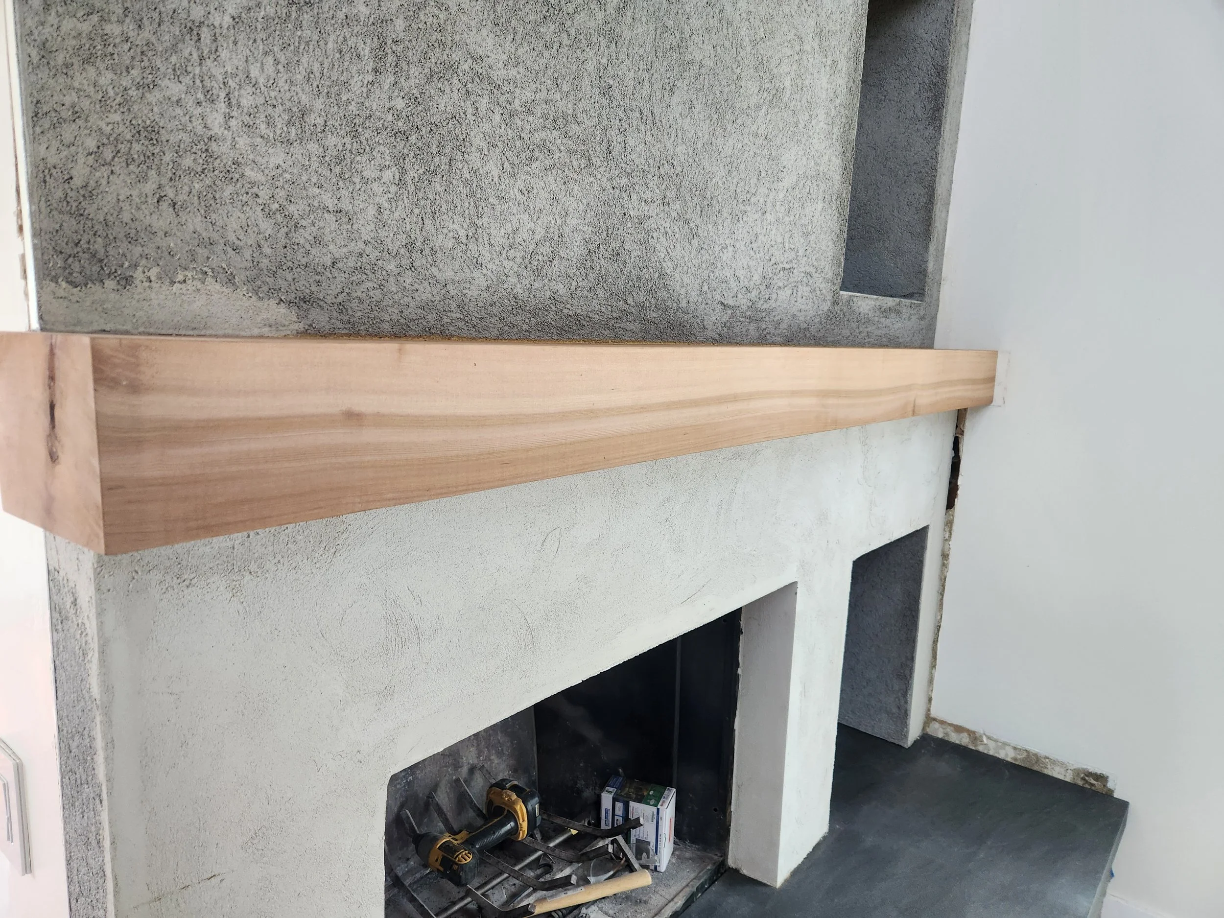 Custom built-in mantel for high end fireplace remodel in San Luis Obispo County. 