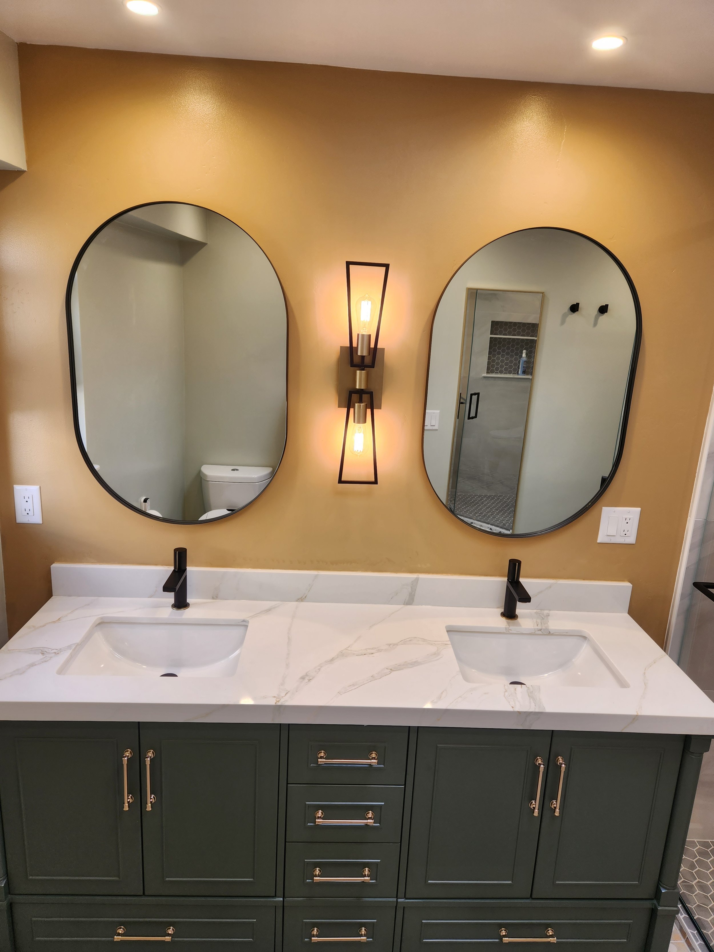 Oakland A's themed bathroom remodel in San Luis Obispo County. Custom double vanity.