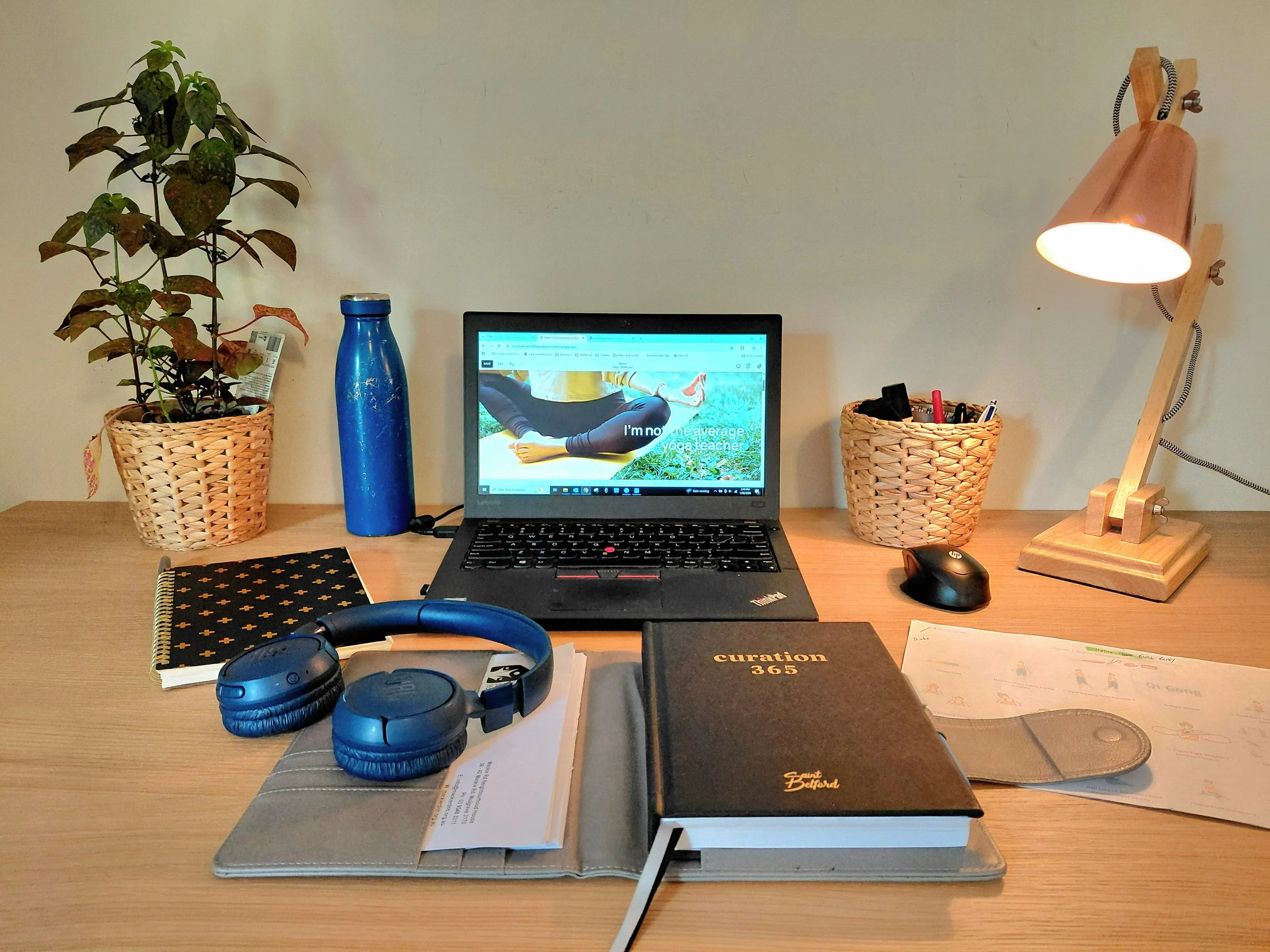 Work-Station-Desk-Laptop-Mouse-Plant-Headphones-Notebook-Water-Pens