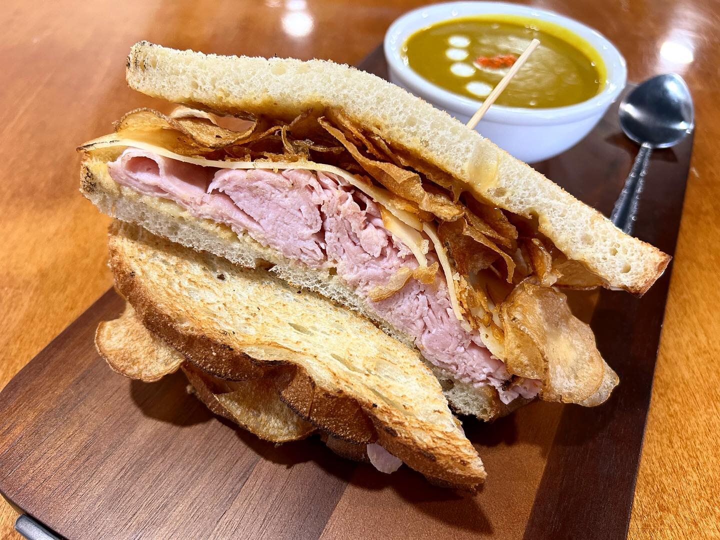 Come tuck in to todays Special Sammie 

Counter Kitchen made ham from local pork loin, garlic aioli,  honey mustard,potato chips and smoked cheddar cheese. 

All made with love, all made in house. 
11-4 friends 🥪🥔🐷