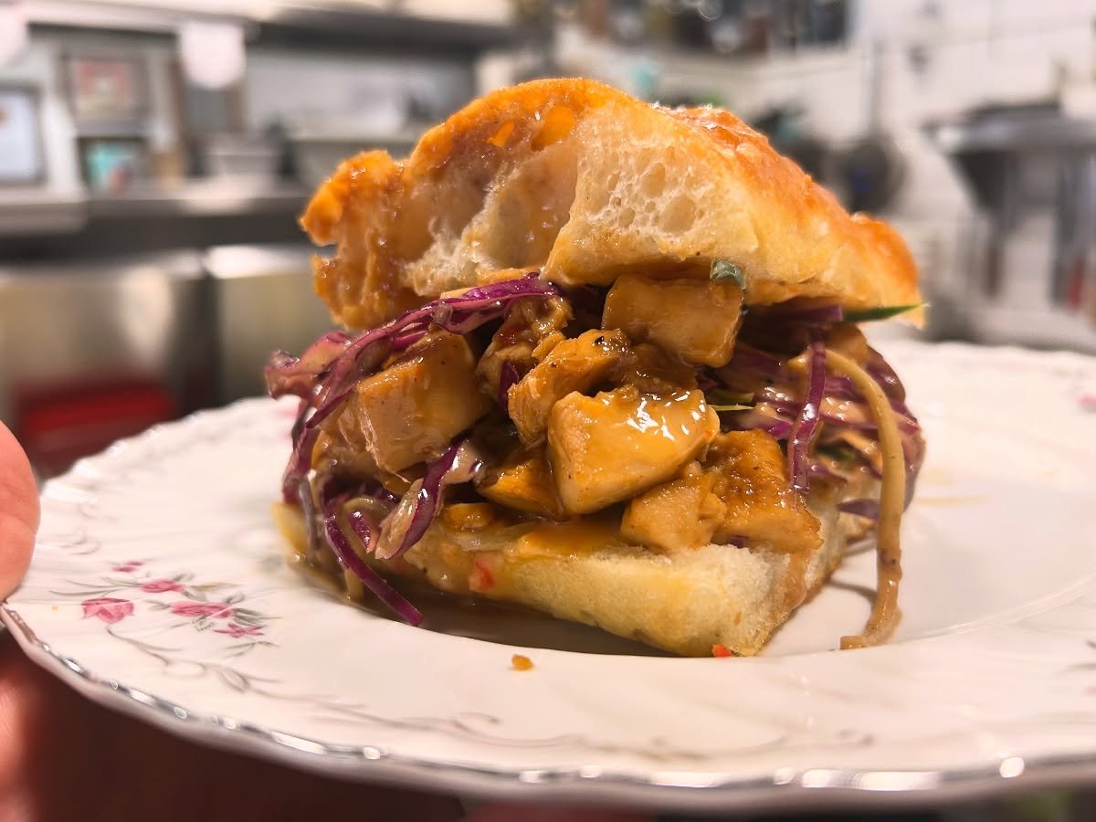 One of the counters crews fave Sammy in high school was subways teriyaki chicken. 
This is our take. Fresh chicken breast diced up in house teriyaki sauce with a black garlic aioli dressed cabbage and cucumber slaw, counter chili ginger mayo all dres