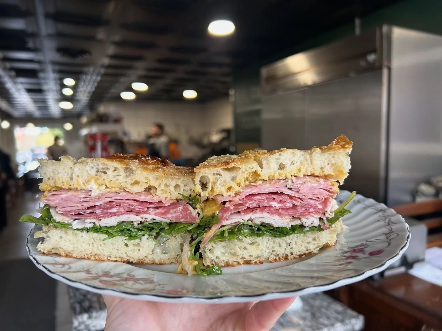 Rainy fall day calls for a harvest Italian club ☔️

House Foccacia, with a roasted pumpkin hummus, basil mozzerella spread, sage aioli, hunters salami, turkey and saucisson sausage, finished with truffle and balsamic dressed arugula 🤤
All house made