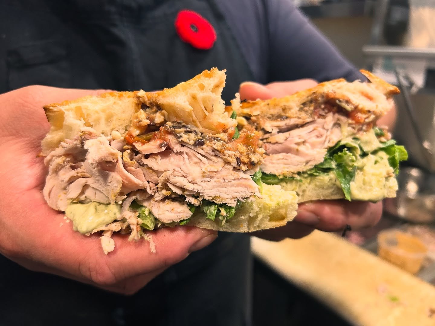 Dreaming of sunnier days with the special. ☀️
House marinated Pork carnitas shaved thin &amp; piled up on house Foccacia with local tomato salsa we preserved, black bean bean spread, cheddar cheese, roasted poblano crema and some crunchy greens 🐷 on
