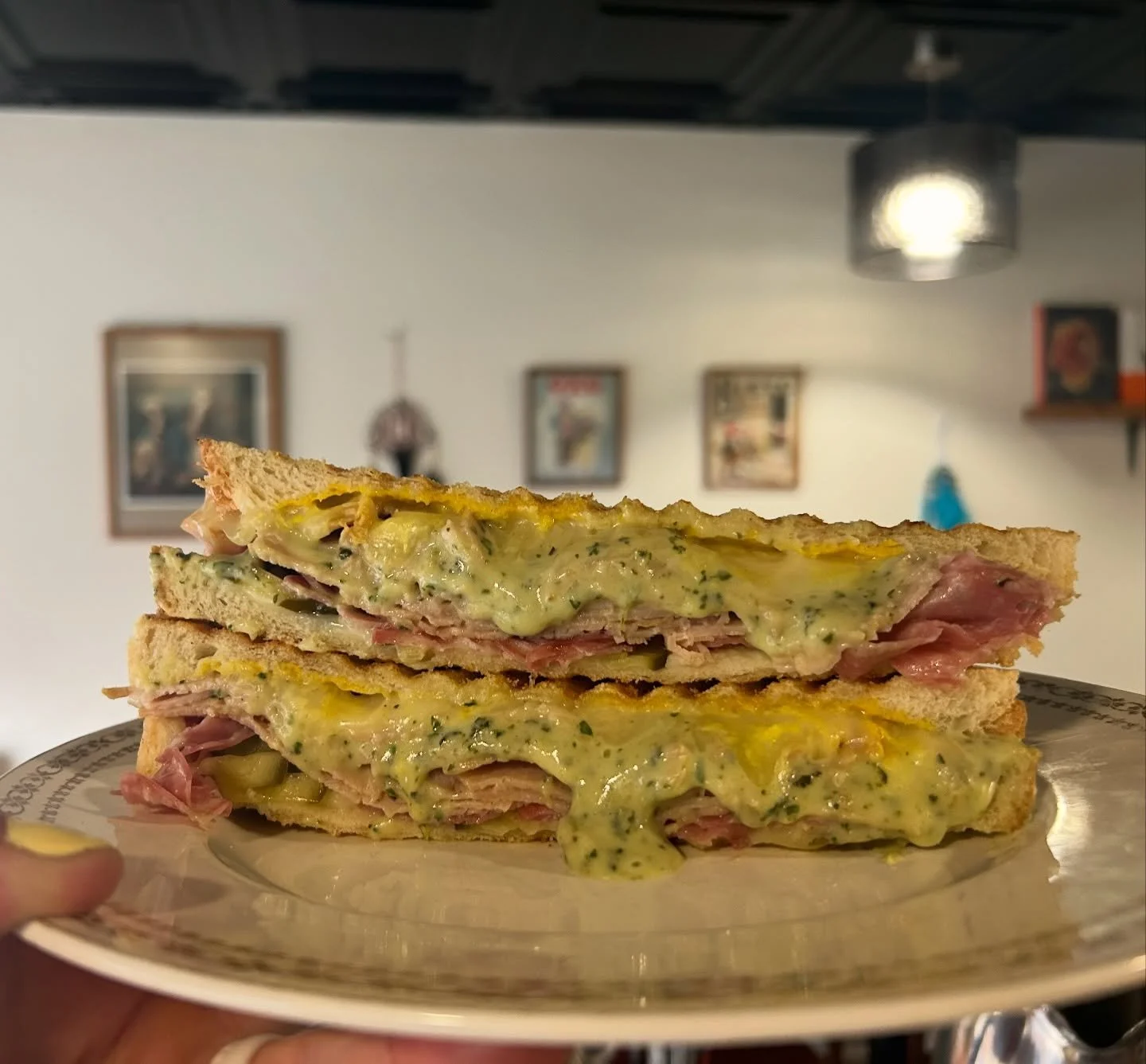 This is a party in your mouth 🎉

House cured ham, saucisson sausage @seedtosausage, yellow mustard @heinz_ca, dill pickles and Swiss cheese. Panini pressed until melty, opened up and smothered in a house made jalape&ntilde;o quesco 🔥💚