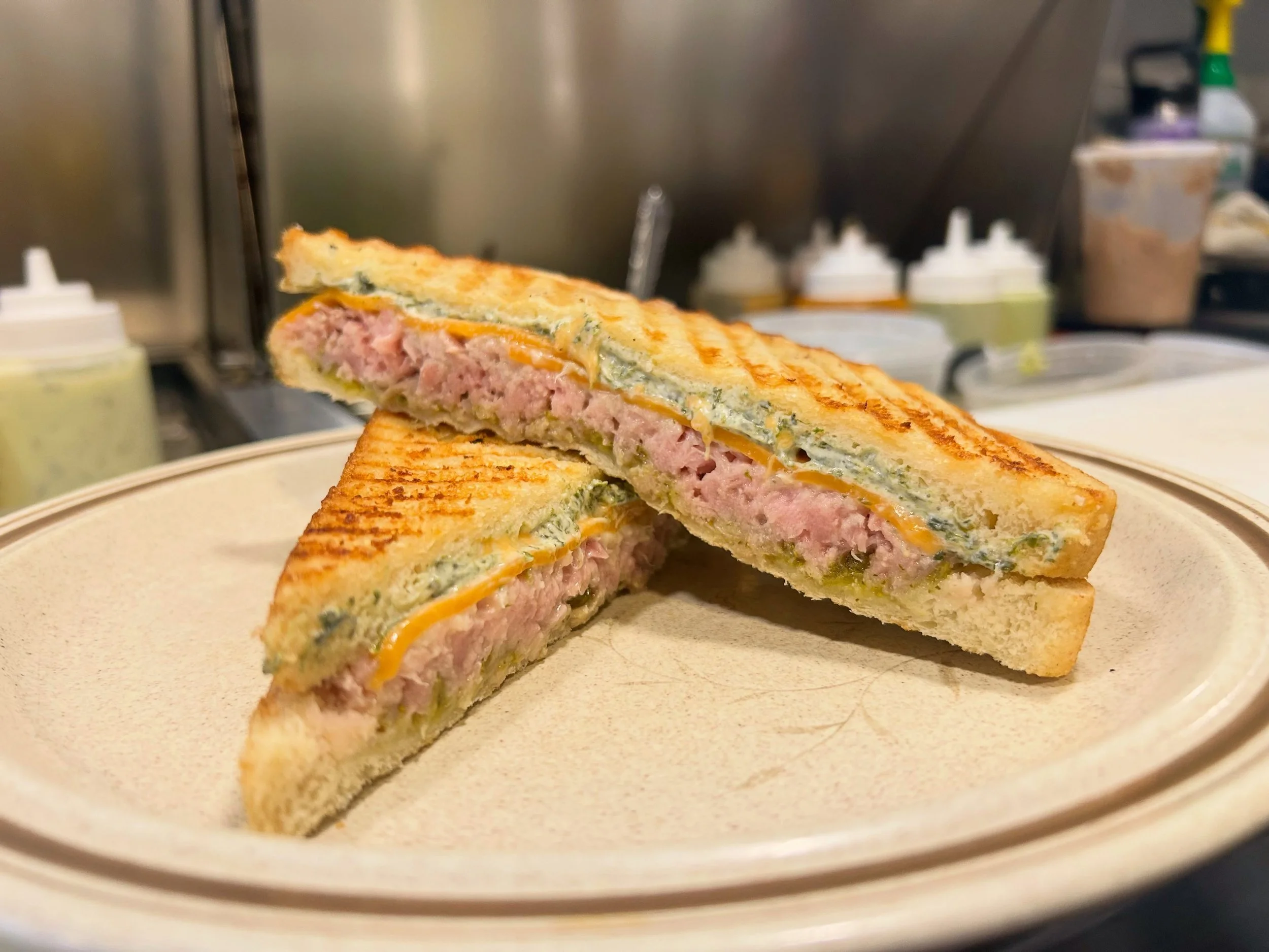 Two posts in one day? 
This one&rsquo;s worthy of it. TUNA MELT 🐟on special while quantities last ☀️
House confit Ahi tuna, spinach dip spread, Counter sweet relish, garlic aioli, and cheddar cheese. 
It&rsquo;s been selling fast, so hurry if you wa