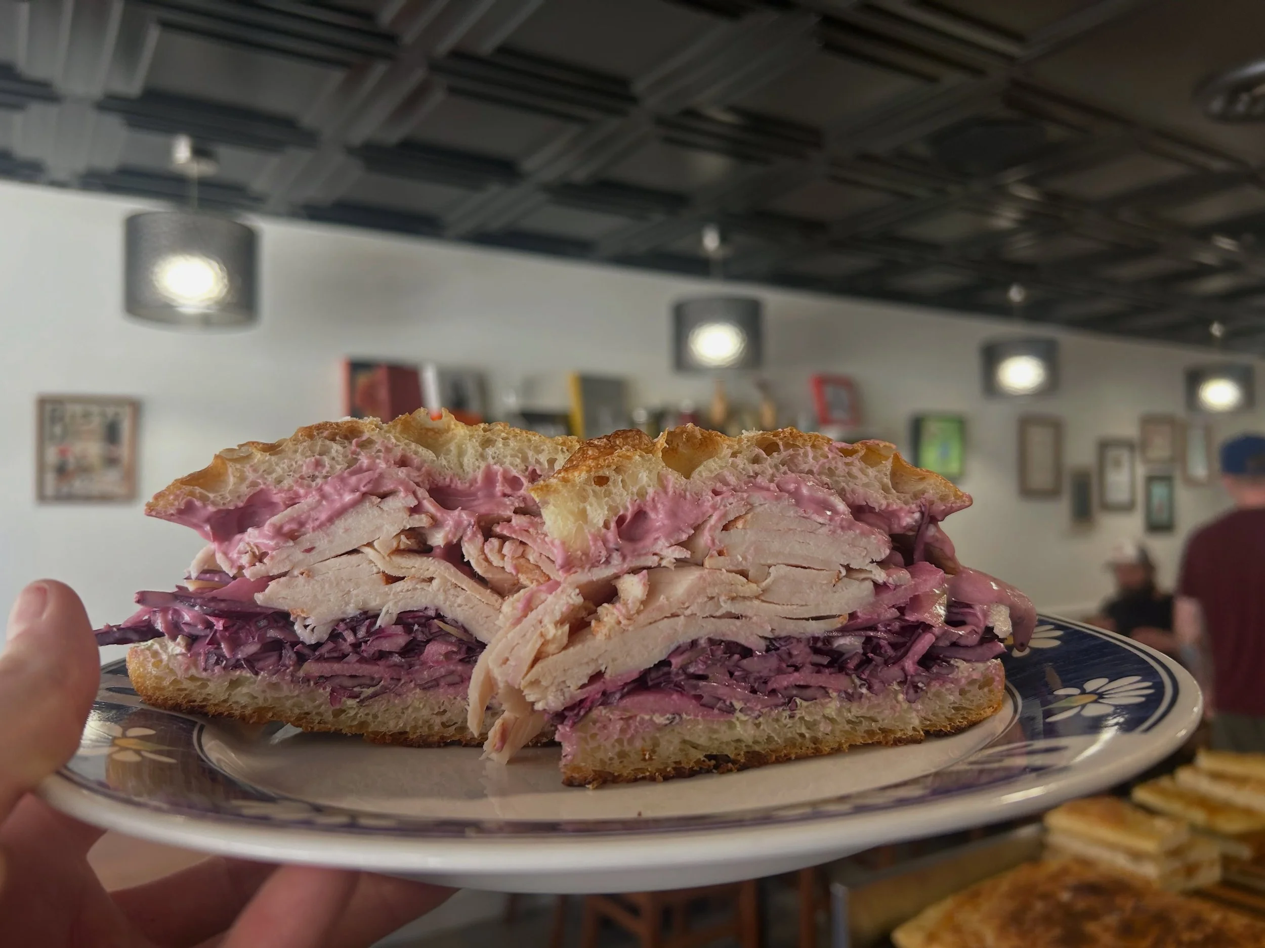 The Pink Lady 💃💕
On Special! 

House made chive butter, cranberry goat cheese spread, preserved lemon &amp; garlic ranched dressed purple cabbage and apple slaw. All stacked up with Turkey on choice bread 🍞 
On special today and tomorrow while it 
