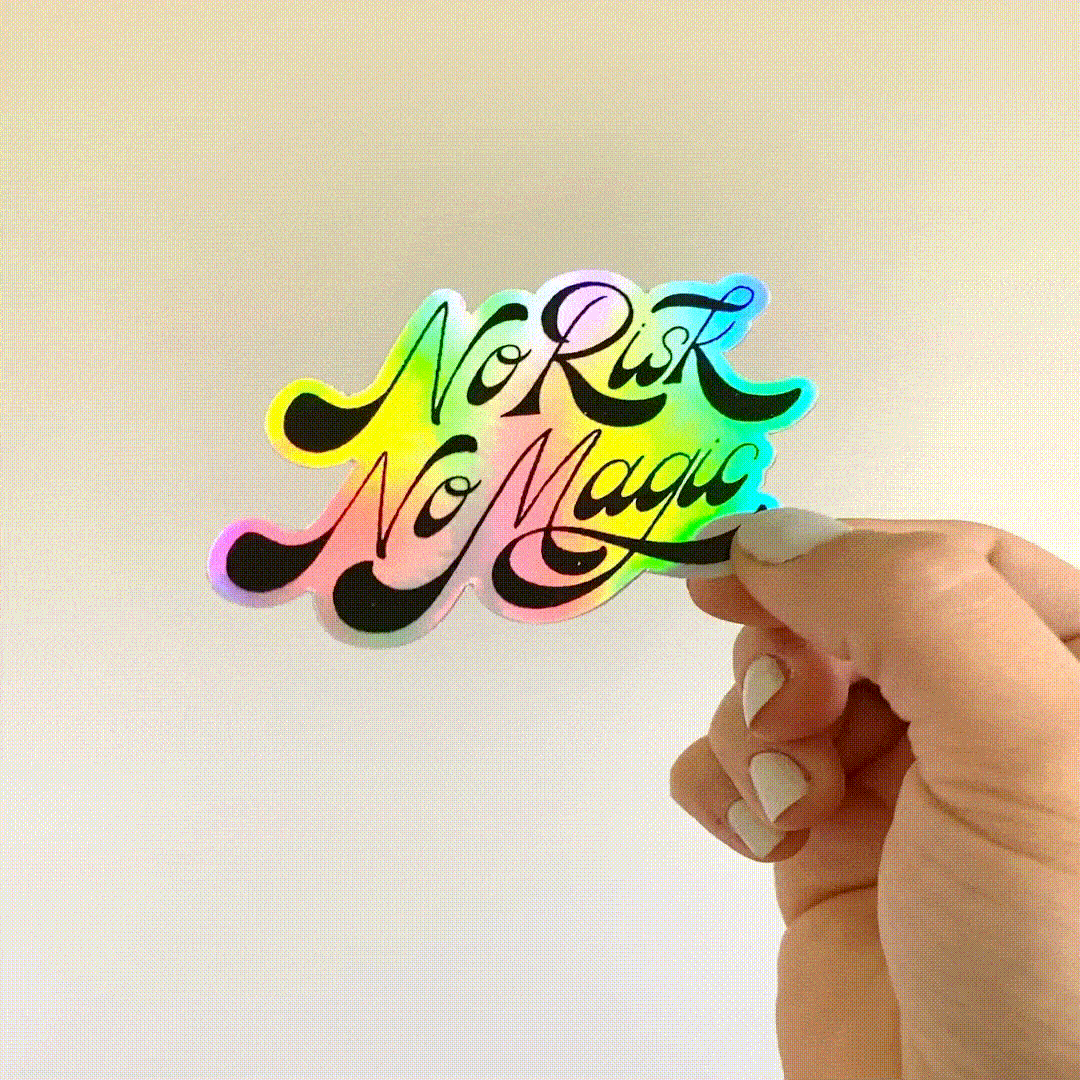 A holographic die-cut sticker, handlettered to say "No Risk, No Magic".