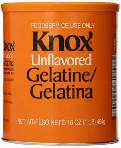 Orange container of Knox unflavored gelatin, 16 oz (1 lb).