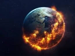 Earth with flames and fire, appearing as if burning or exploding in space.