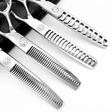 Set of five stainless steel hair thinning razors arranged in a row, each with different cutting teeth.