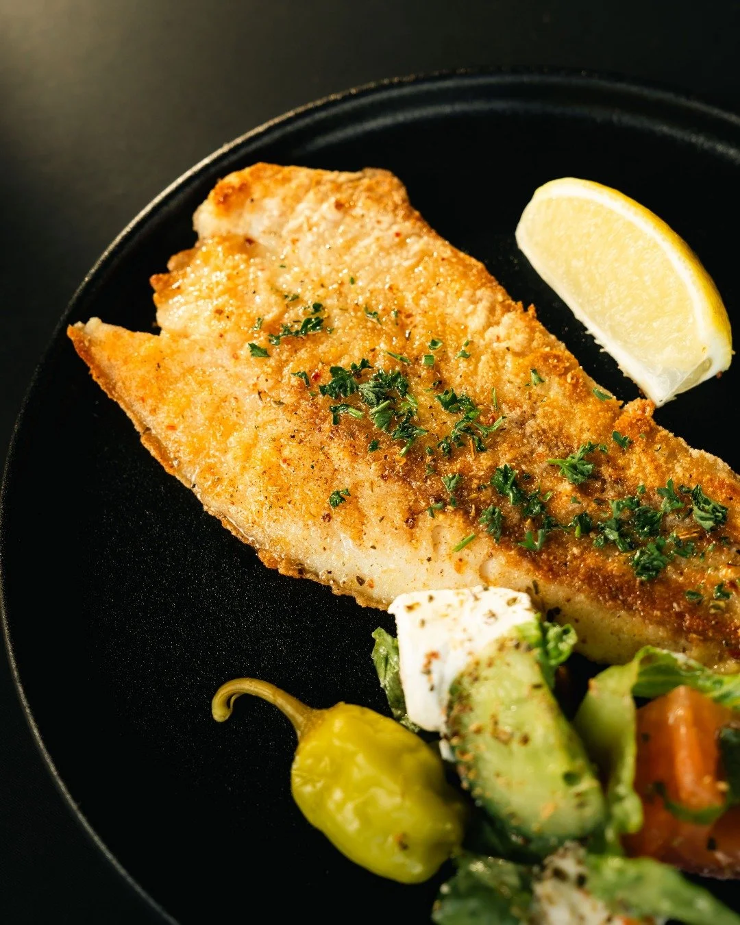 🐟 Looking for the healthier option this winter?

Our grilled fish of the day has you covered.

Fresh fish, simply baked, finished with a squeeze of lemon and served with a fresh side salad. Clean, comforting and full of flavour without the heaviness