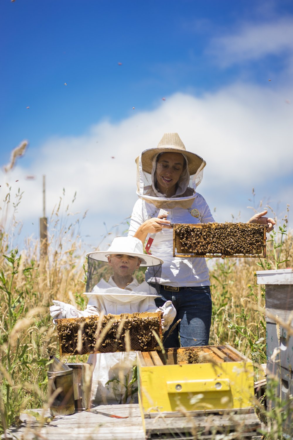 BEE FAMILY:
Missy Bee and her son Bodhi while checking on the Bayside bees.