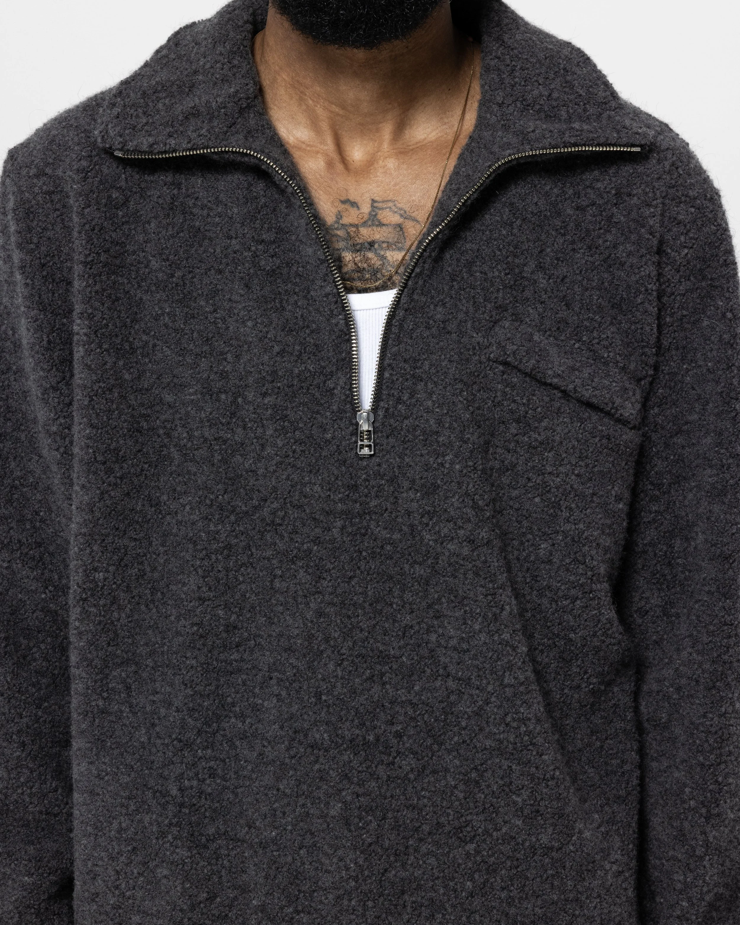 TravelerHalfZip_DarkGrey_CHEST.jpg