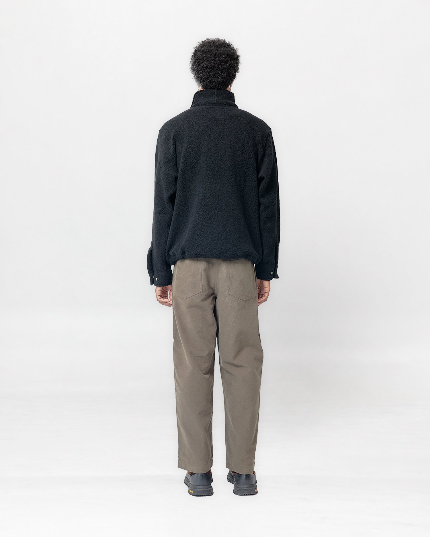 Traveler Half Zip Black Back.jpg