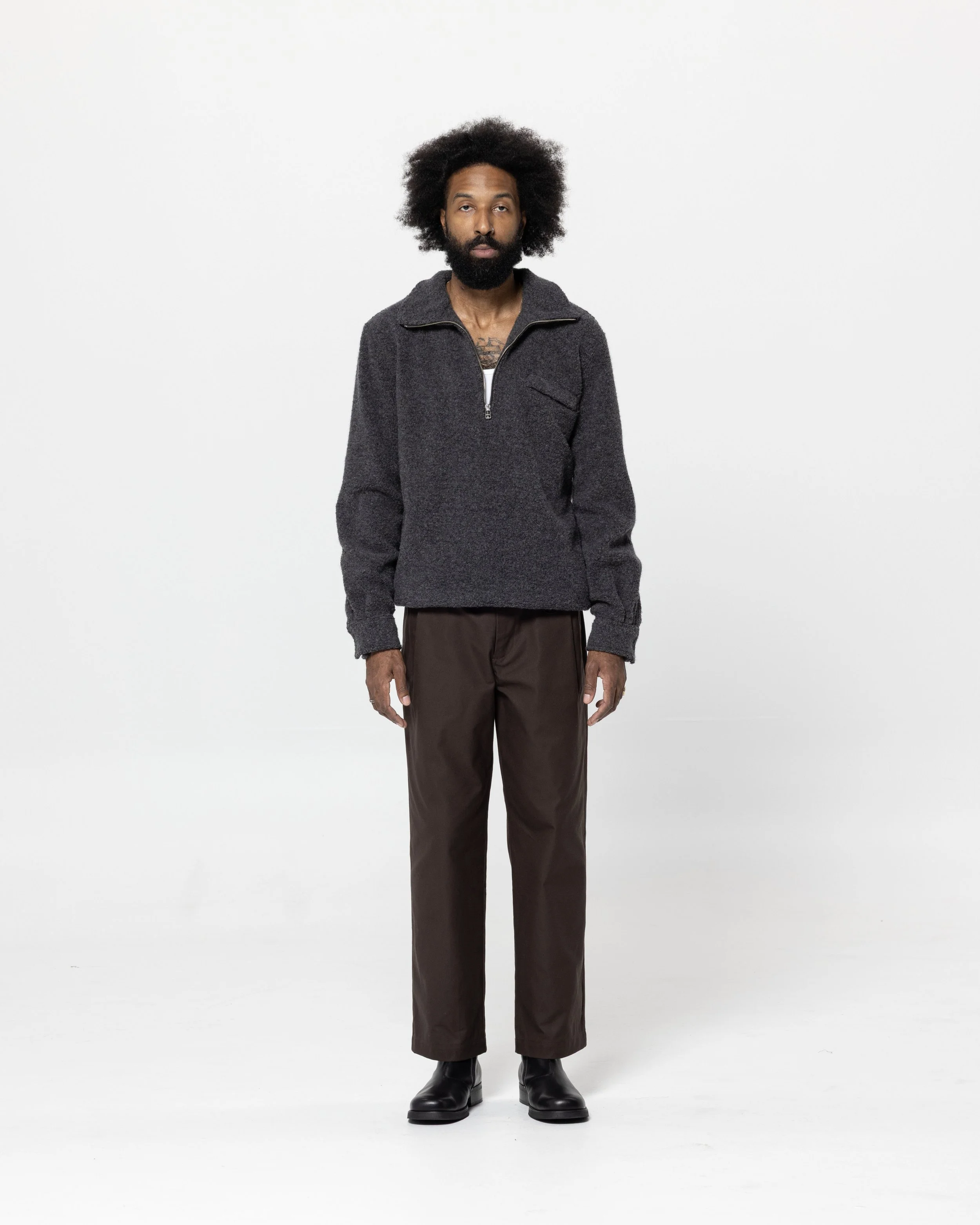 TravelerHalfZip_DarkGrey_FRONT.jpg