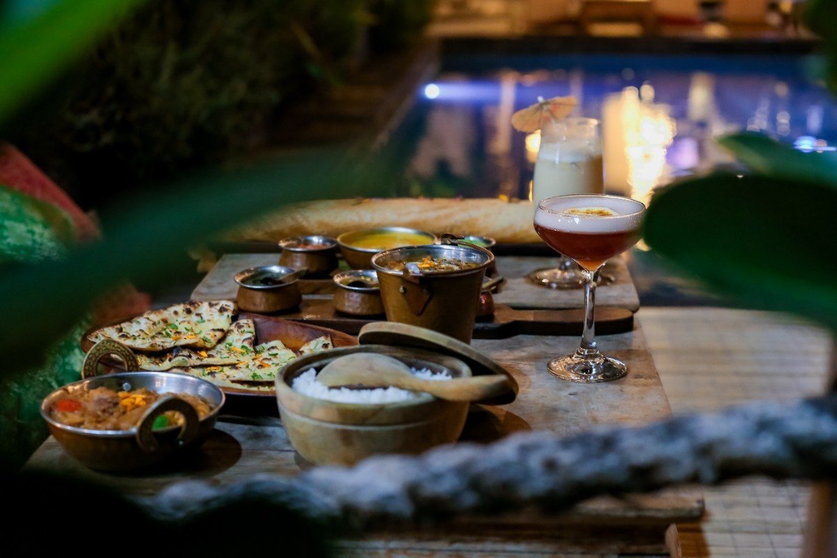 Indian curries, naan, rice and dosa served with drinks at Pesona Lounge Trawangan in Gili Trawangan.