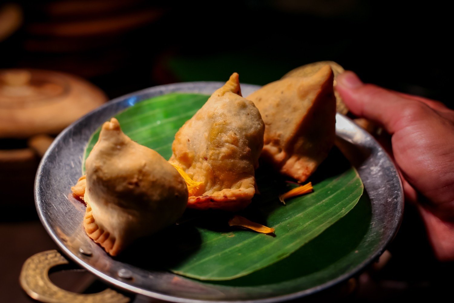 authentic indian samosa with crispy pastry and flavorful spiced filling at pesona lounge trawangan