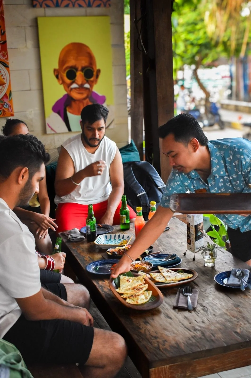 Group enjoying authentic Indian food at Pesona Lounge Gili Trawangan