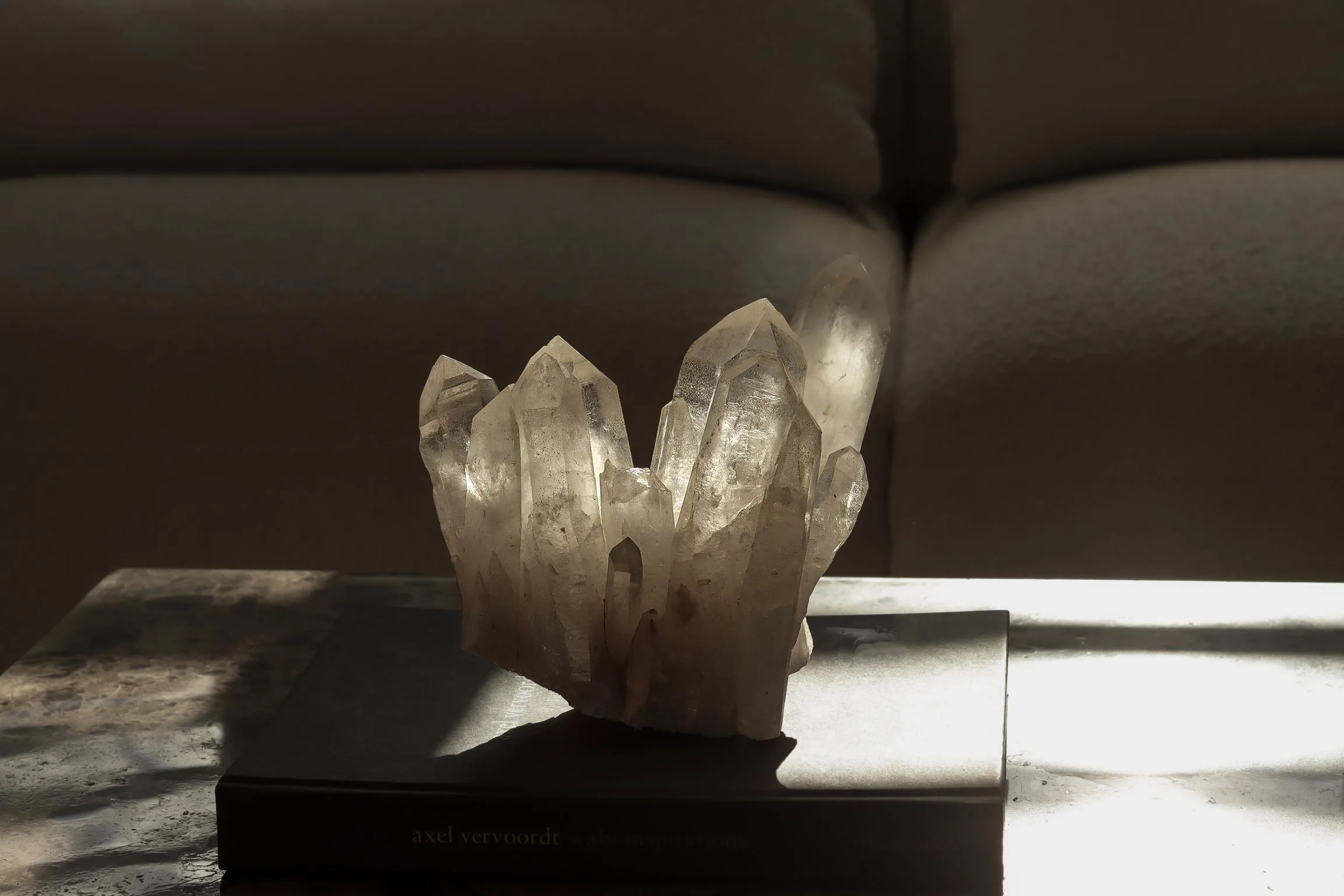 New Moon in Aquarius. Crystals on dining room coffee table.