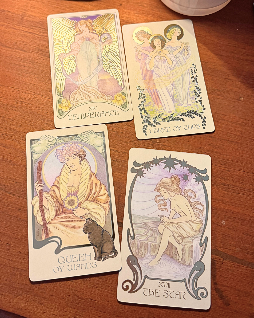 The Star Tarot Card with Temperance, Three of Cups and Queen of Wands