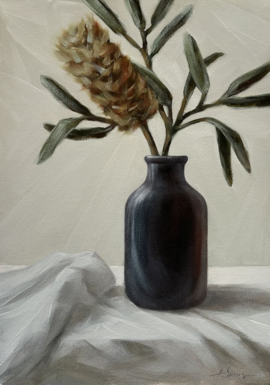 Black vase and banksia