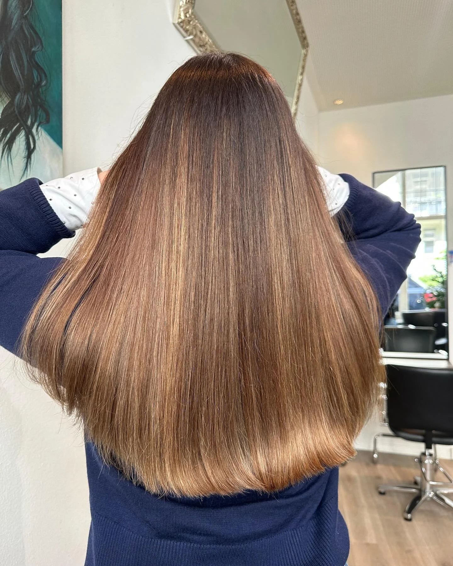 Photo of professional hair color correction.