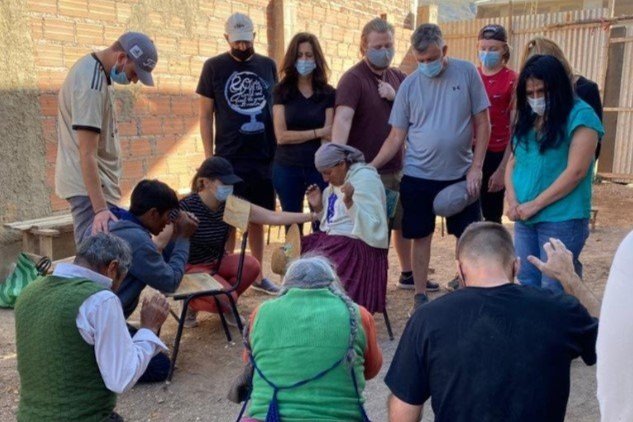  Sidewalk Sunday school in local village 