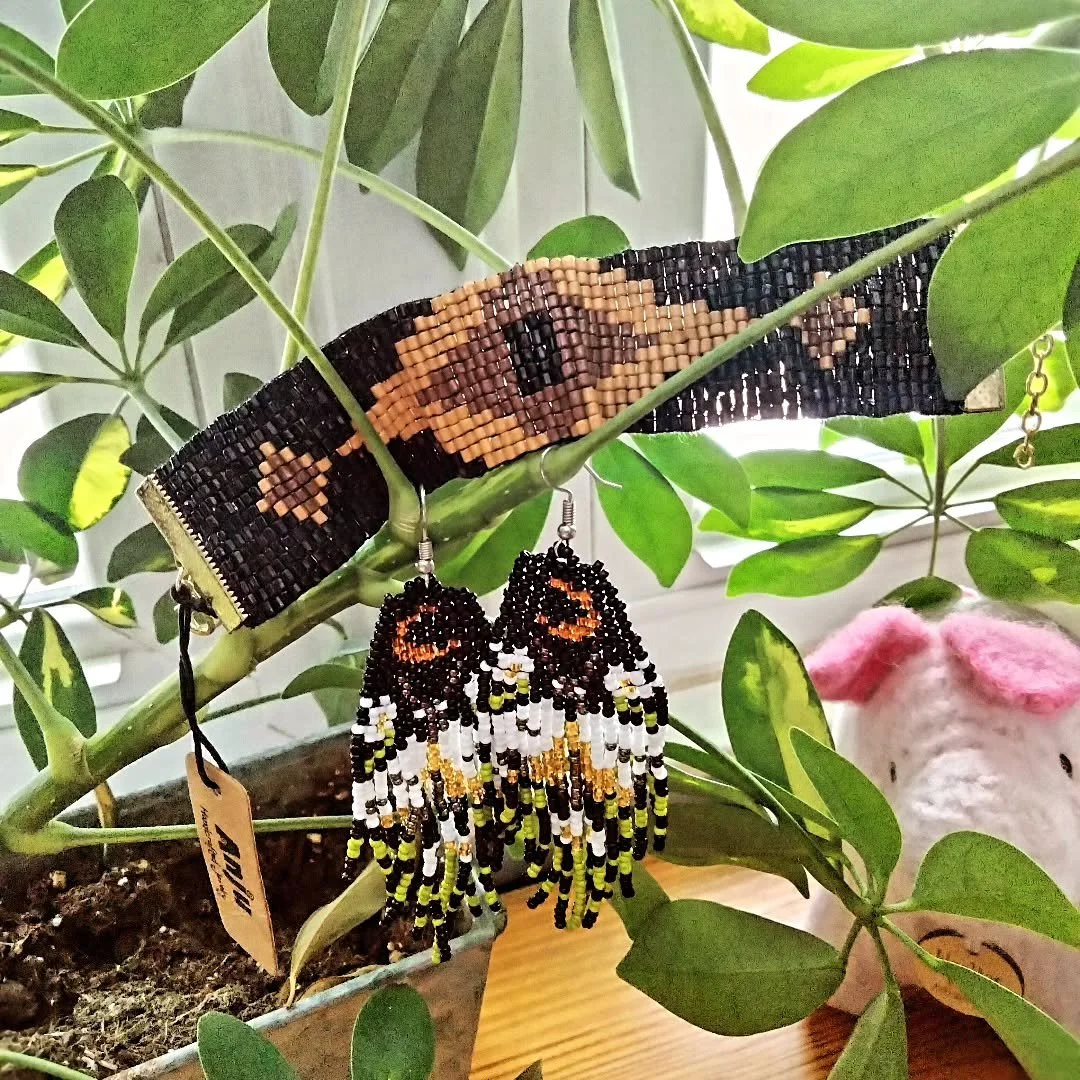 Anyone who has the patience to make such intricate beaded jewelry is amazing to me. I lack not only the patience but also the fine motor skills. (You should see my handwriting...or not...I had teachers tell me in school, "I can't believe a girl 