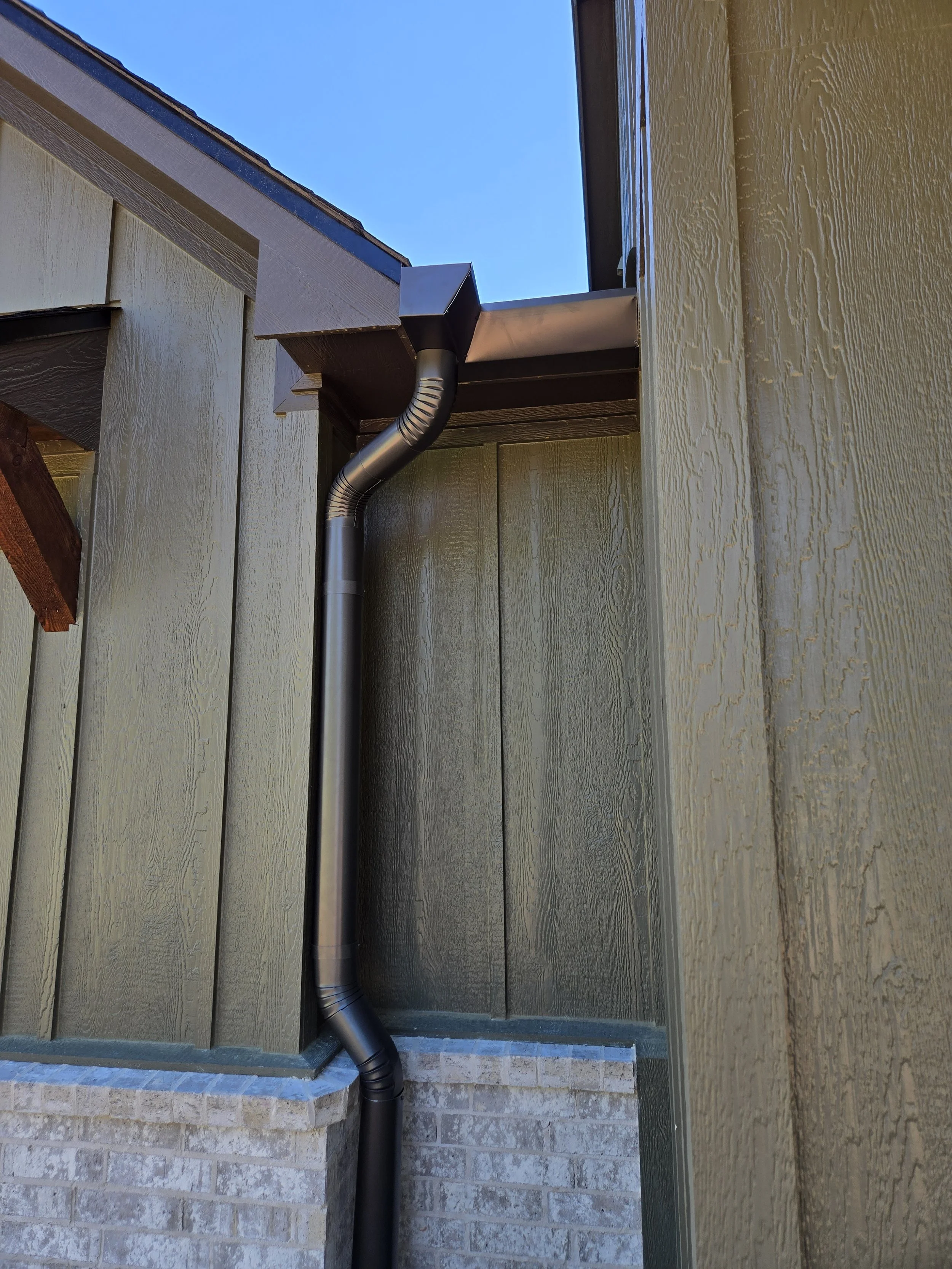 Straight Face Gutter with Round Spouts in Marshall Texas