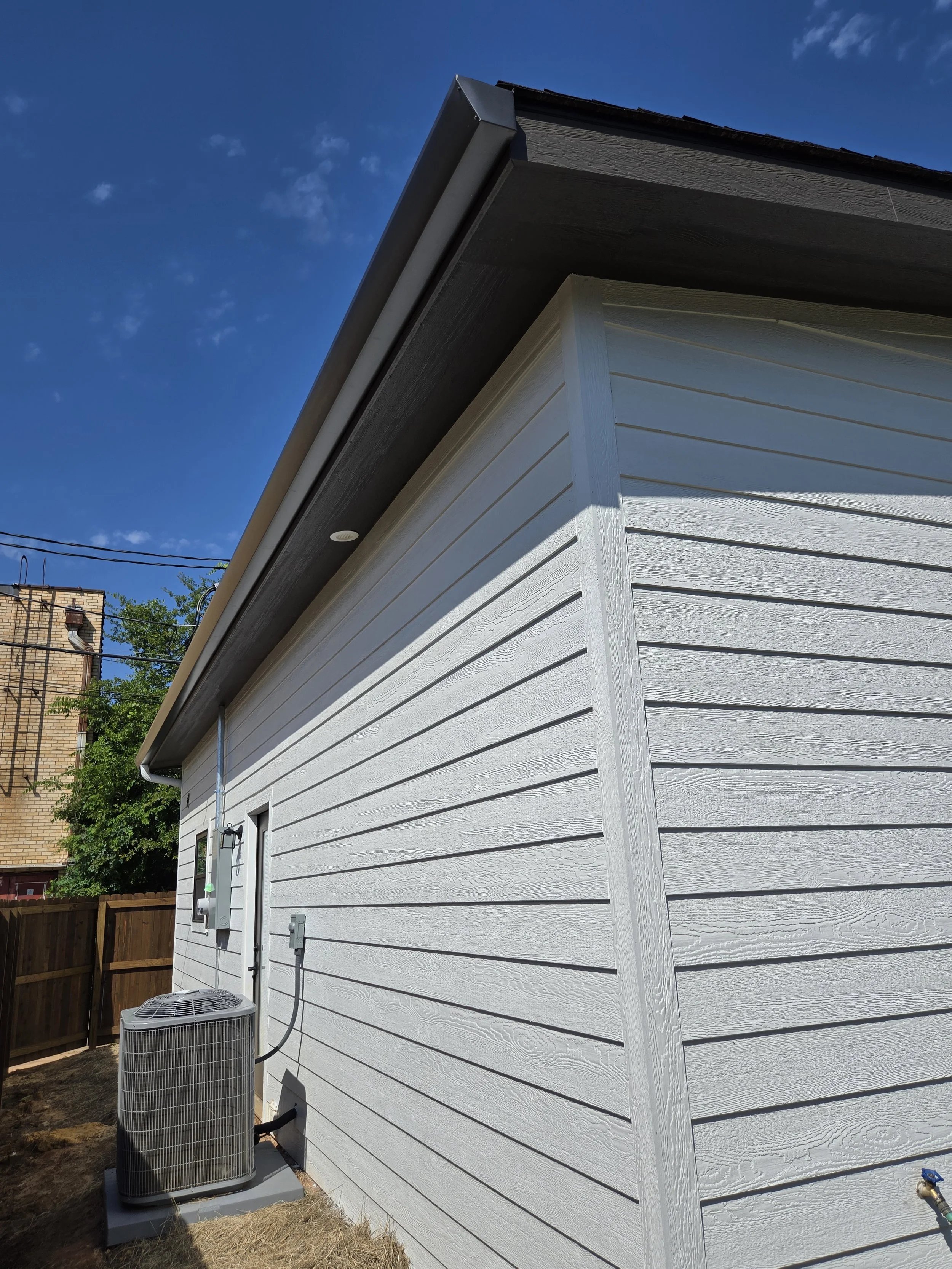 Straight Face Gutter with Round Spouts in Gladewater Texas