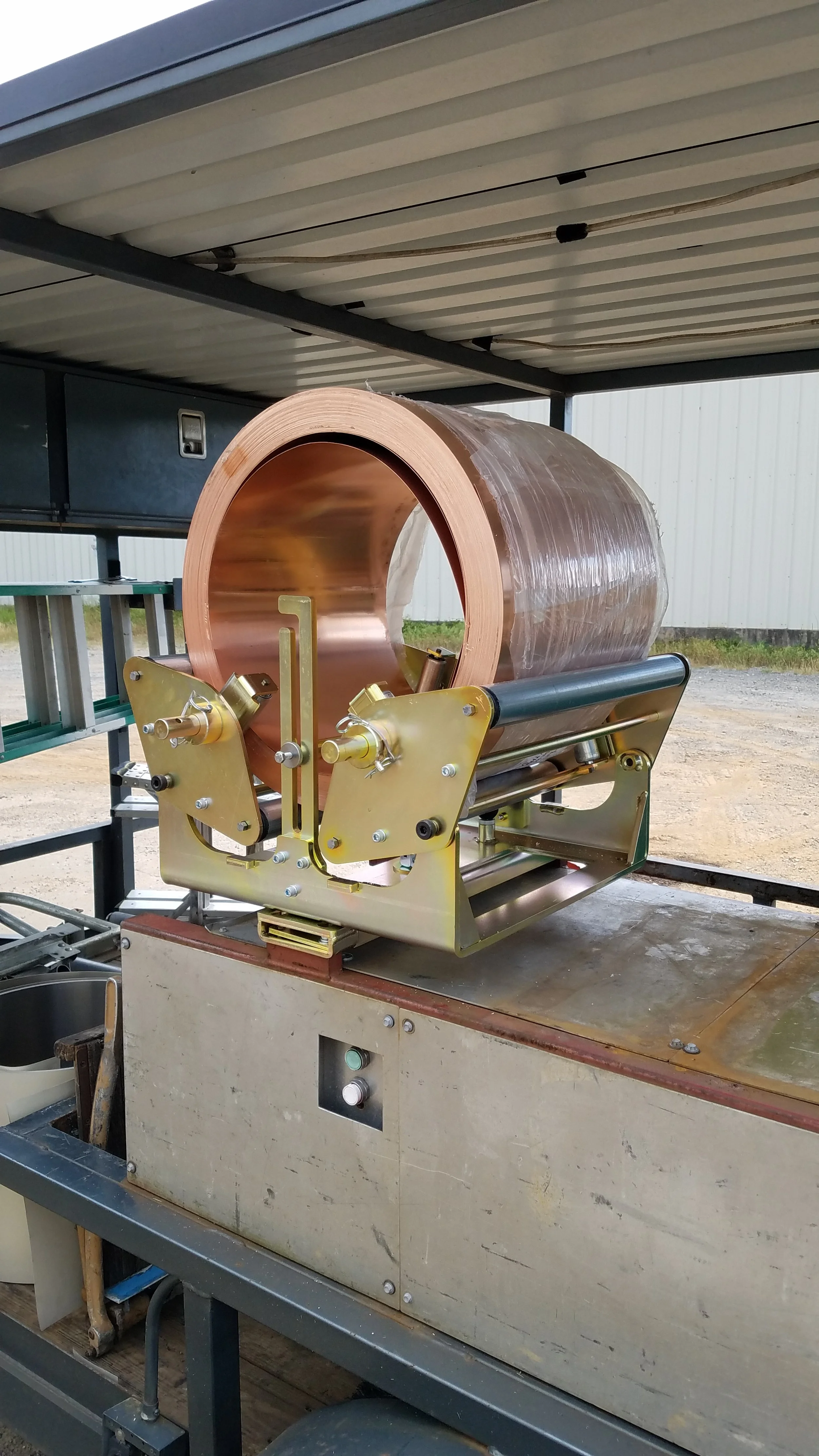 Solid Copper Coil about to be formed into Gutter