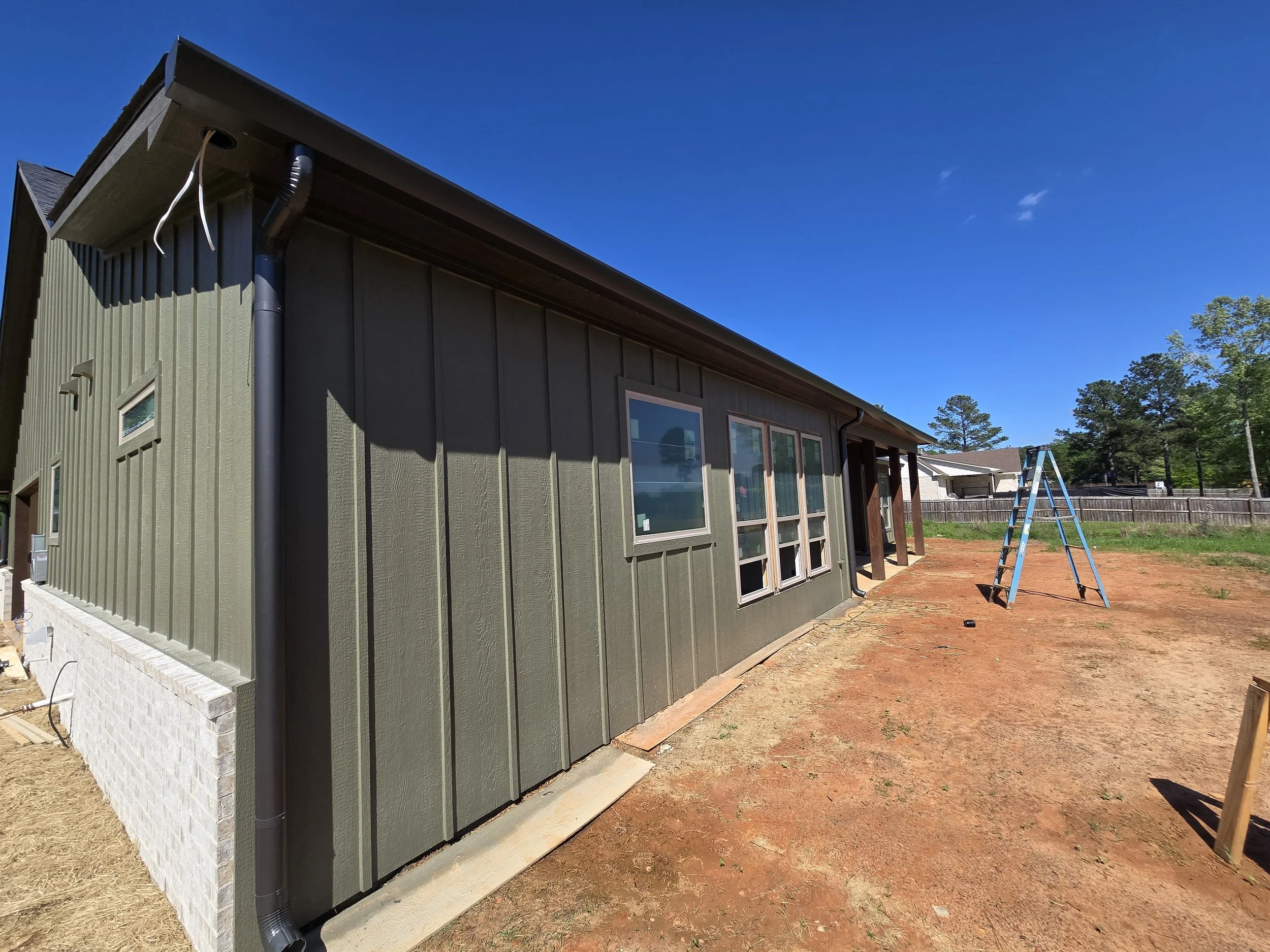 Straight Face Gutter with Round Spouts in Marshall Texas