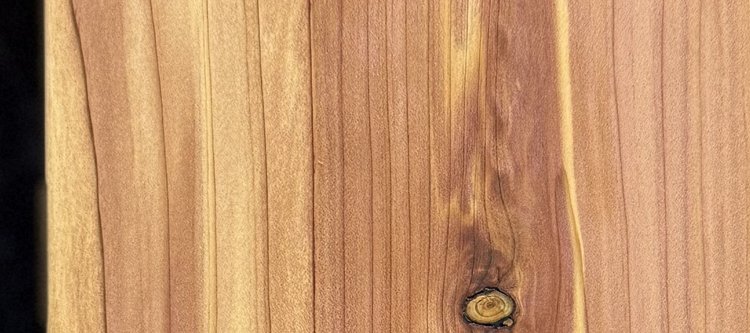 Detail of Eastern Red Cedar grain — figured wood texture, photographed at Raw Heartwood