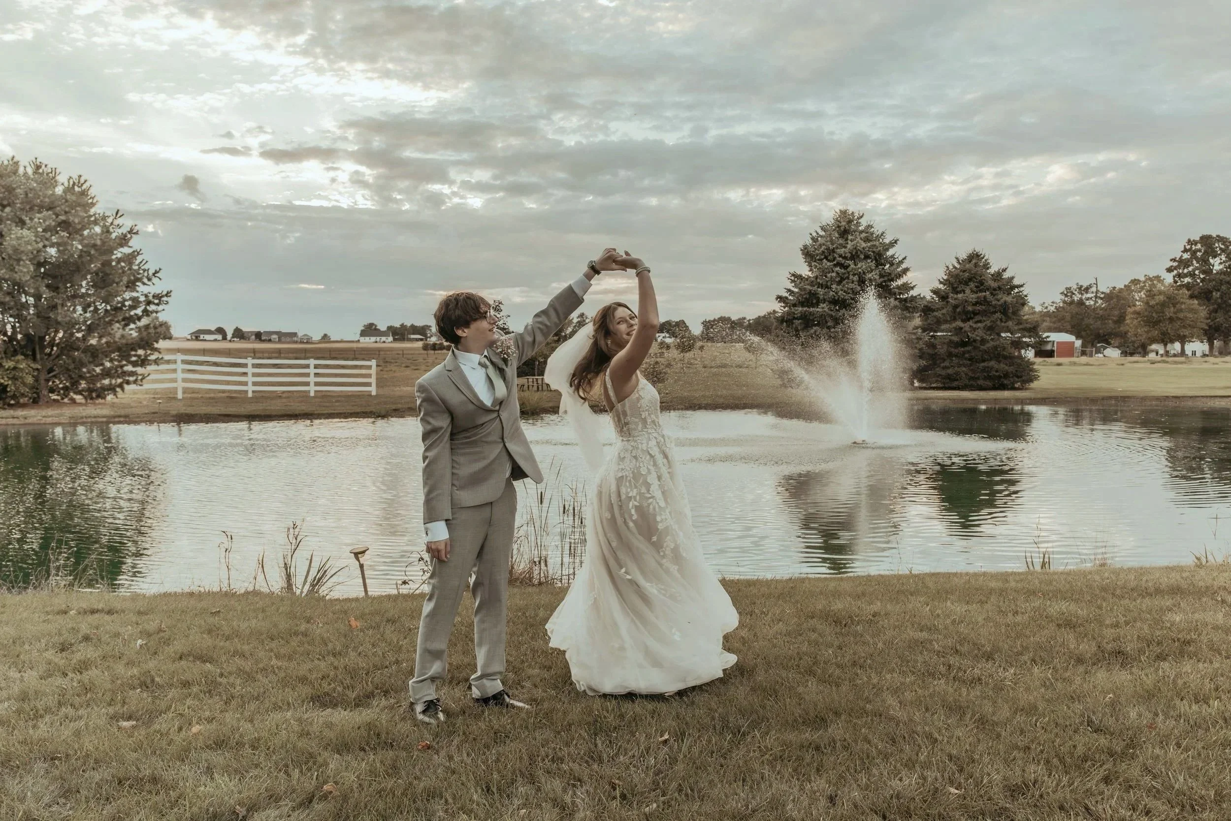 Wedding couple dancing by pond at Maple Lane Farm in Urbana, Ohio