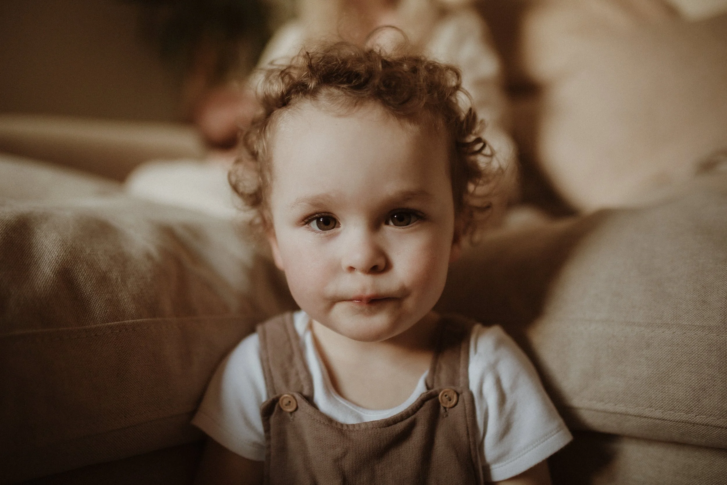 little boy looking at the camera