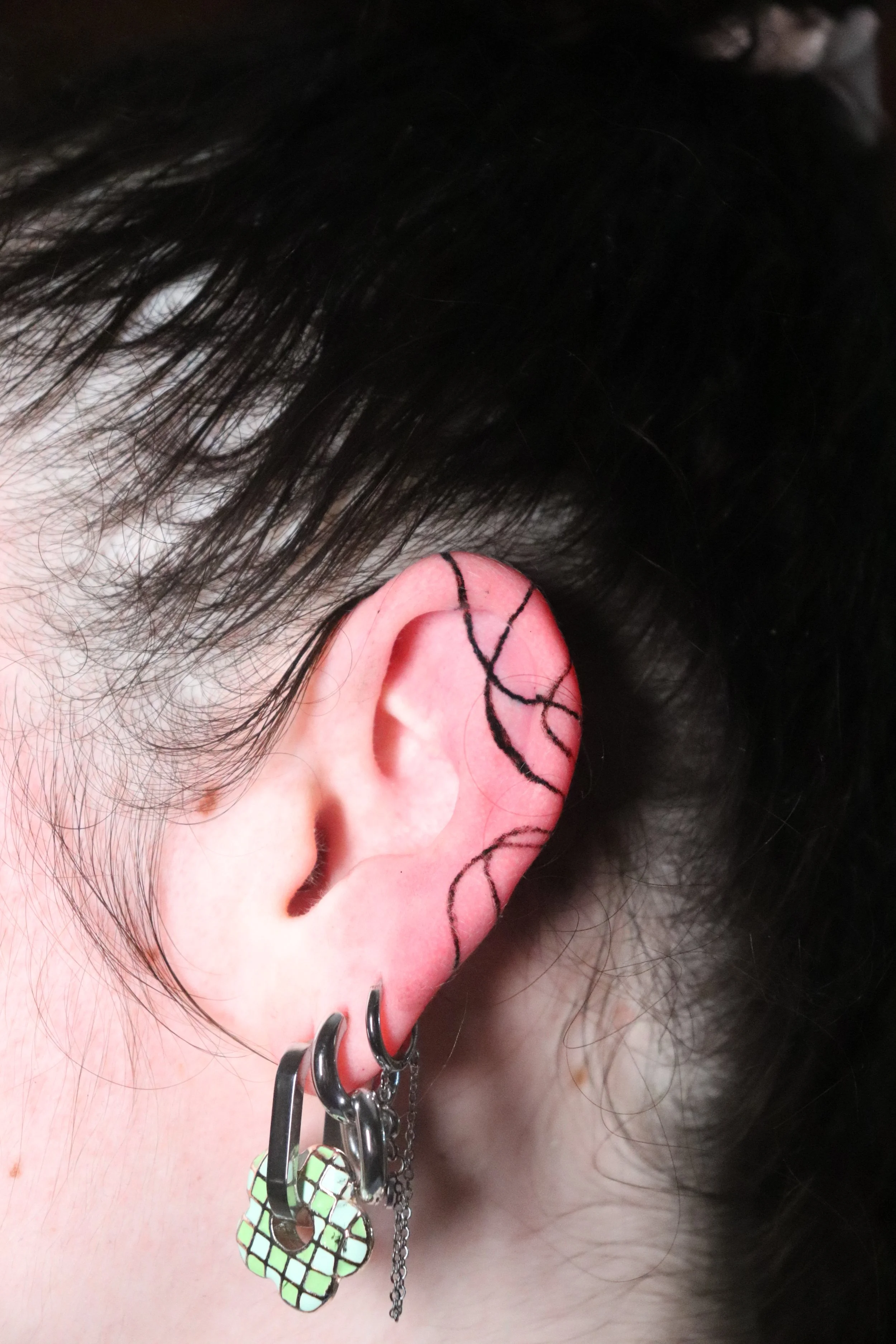 Client_Ear Tattoo2.JPG