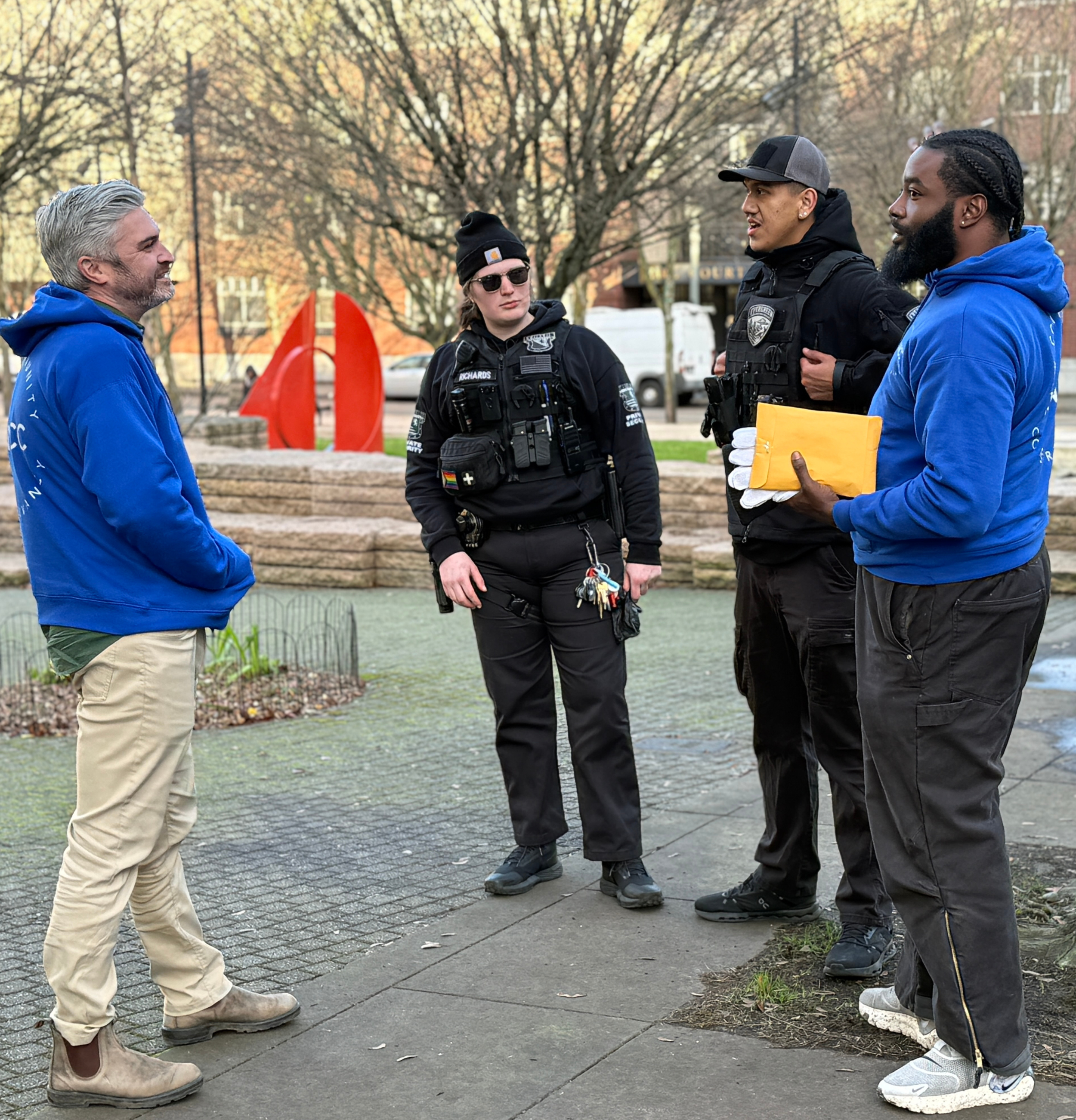 NWCC Humanitarian Team with security  team in Pearl District