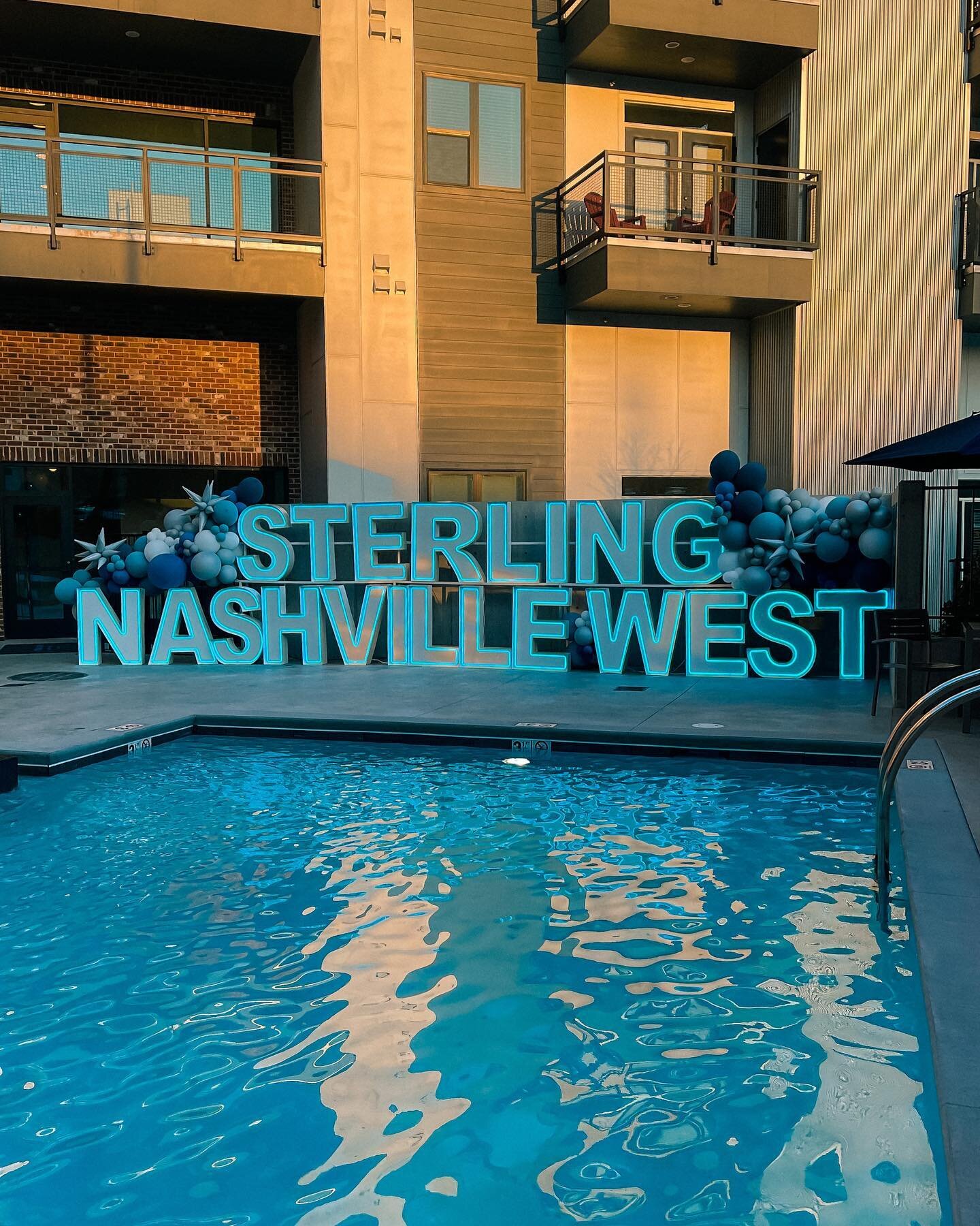 💛🩵Poolside Golden Hour🩵💛 @sterlingnashvillewest &lsquo;s backdrop was a show stopper for their ribbon cutting today!!
.
Balloons by @franklin_celebrations 
.
#SterlingNashvilleWest
#LedMarquee #LedMarqueeNashville
.
#MarqueeLetters #NashvilleEven