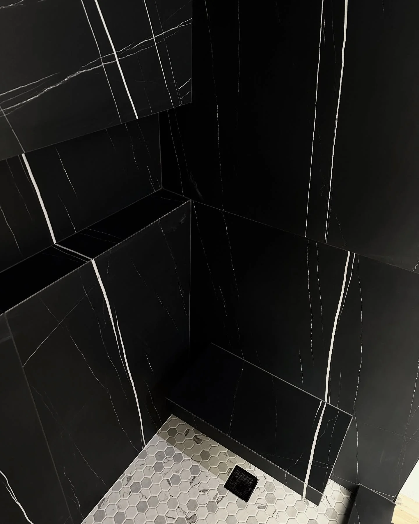 48&rdquo; x 48&rdquo; Ceramic Tile
Mitered Niche
Mitered Bench
Mitered Shower Curb 
Custom Vein Matching 
&bull;
&bull;
&bull;
#ceramic #tile #bathroom #new #install #construction #black #white #shower #homeimprovement